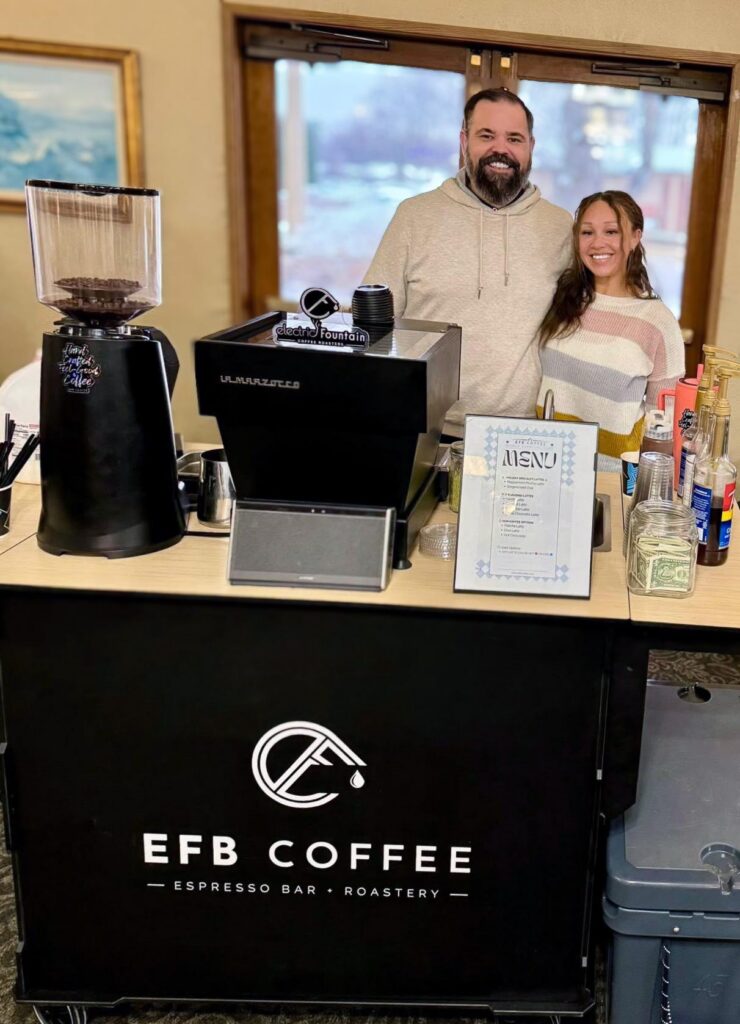 The owners of EFB coffee smile for a photo during a visit from The Montvale Senior Living.